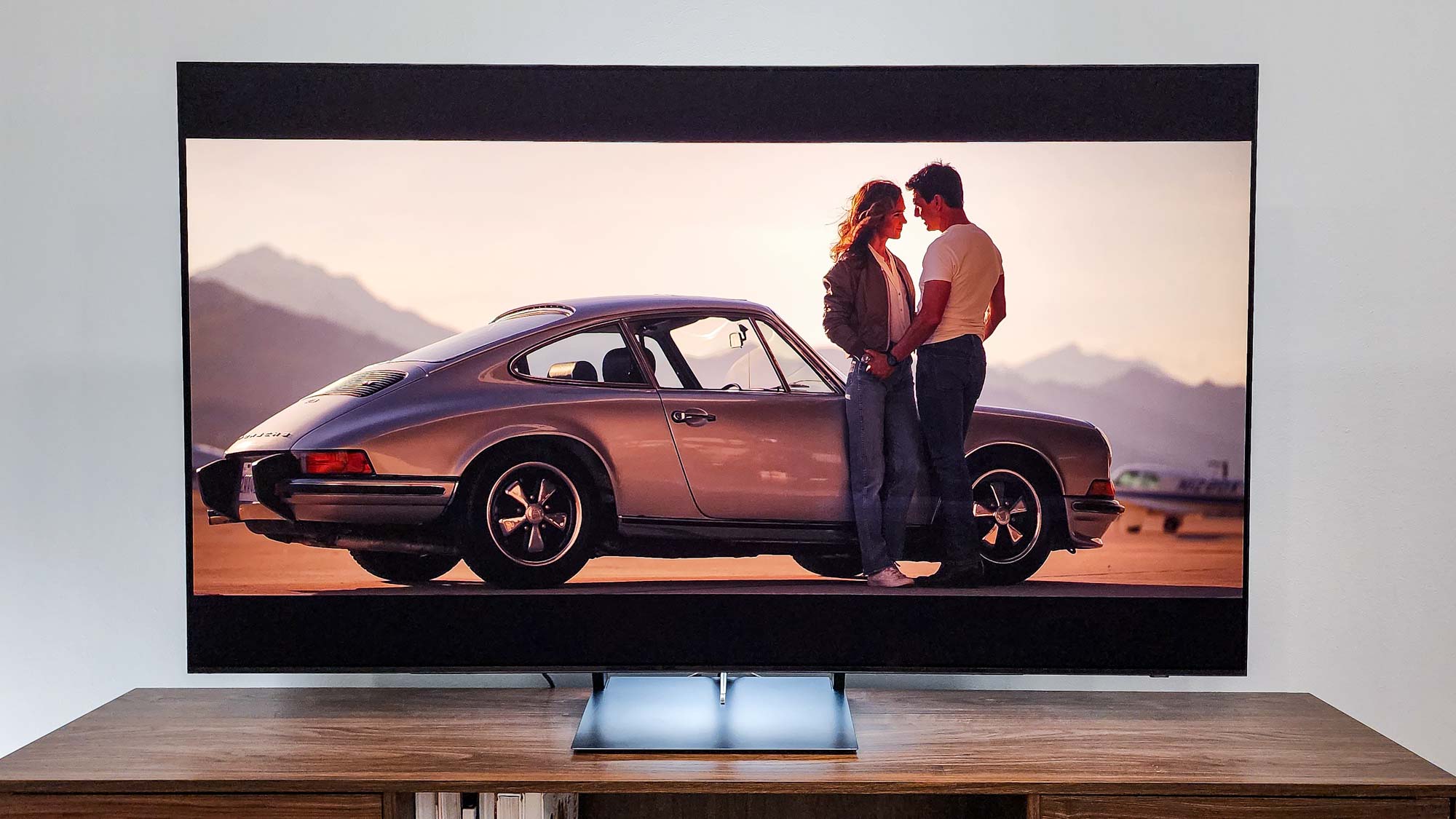 Samsung OLED S90C on desk in living room