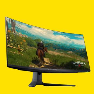 Alienware monitor on a yellow background.
