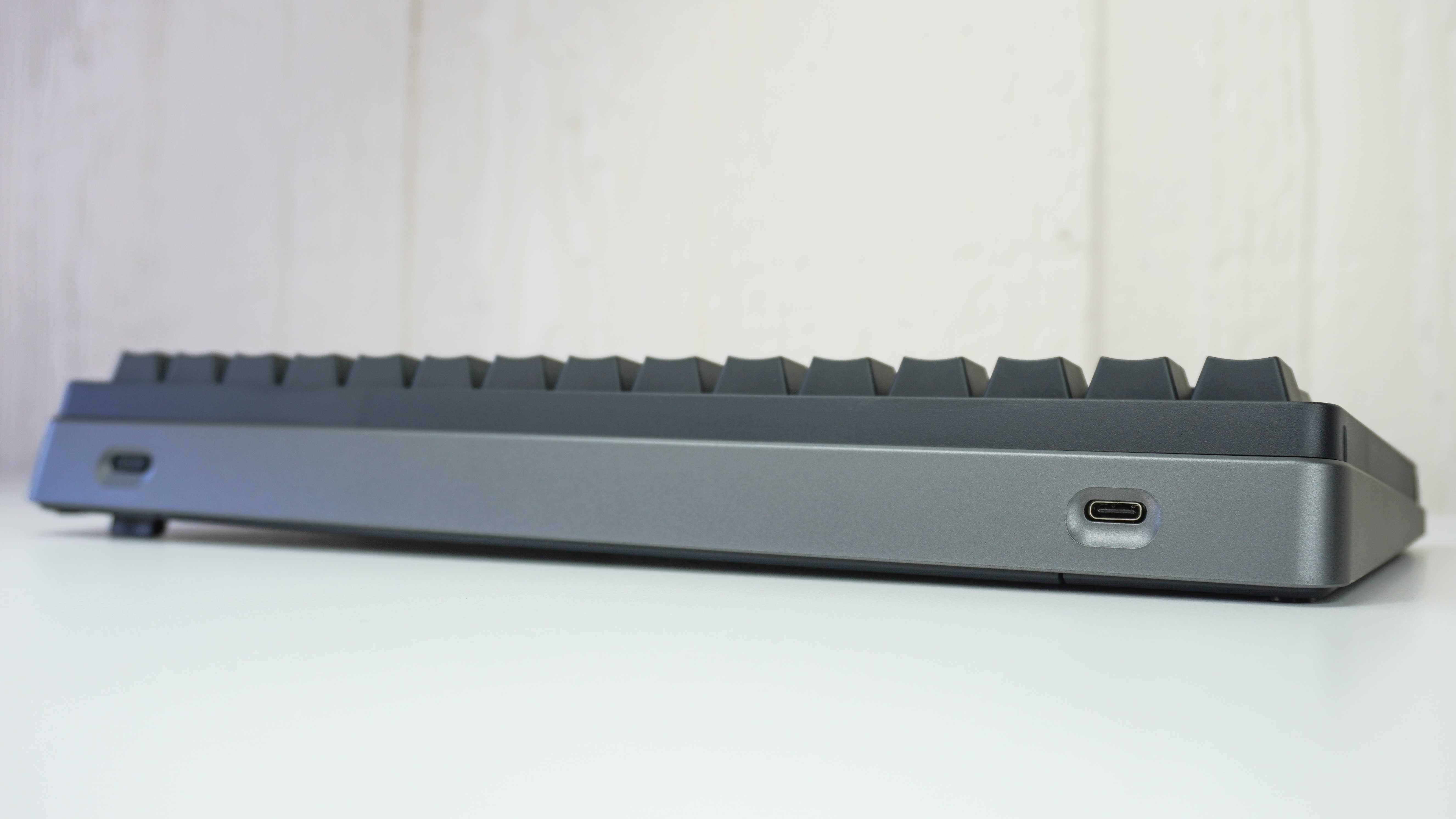 The backside of the HHKB Studio showing its USB-C port and power button