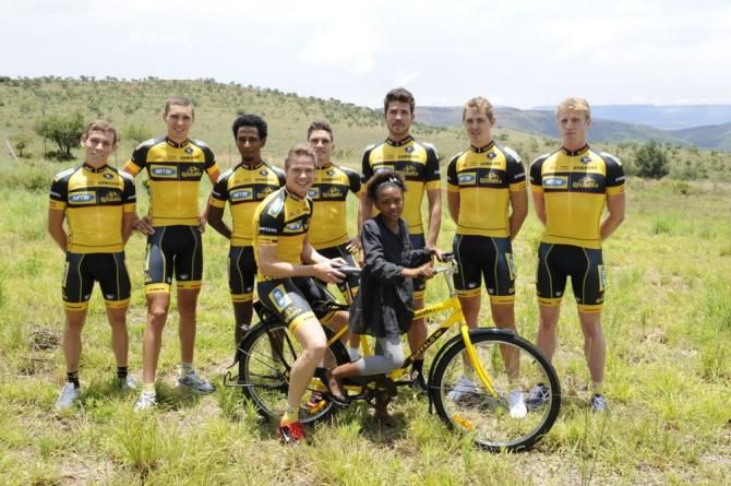 Martin Reimer catches a ride from one of Qhubeka's Buffalo Bike recipients