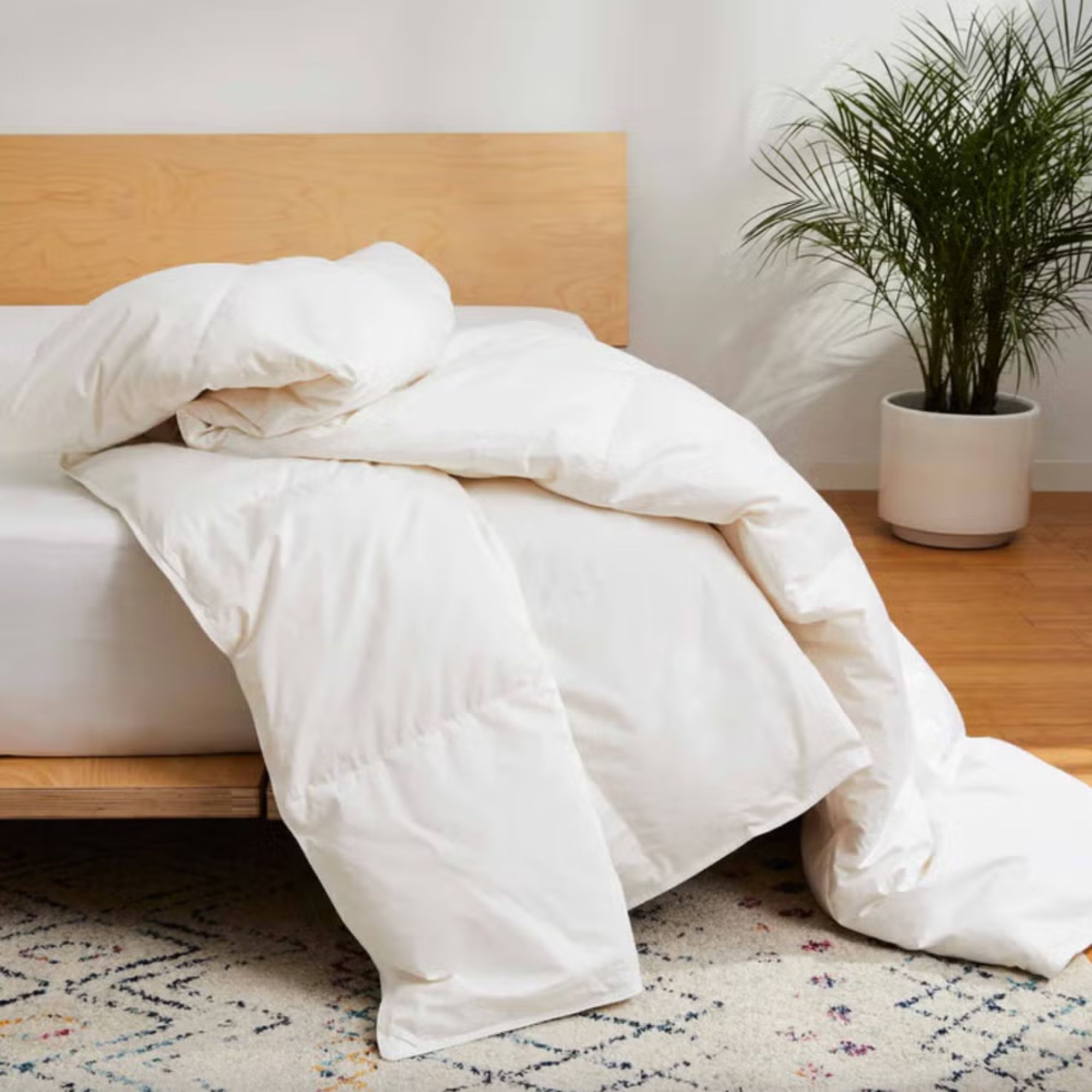 Brooklinen Down Comforter on a bed. 