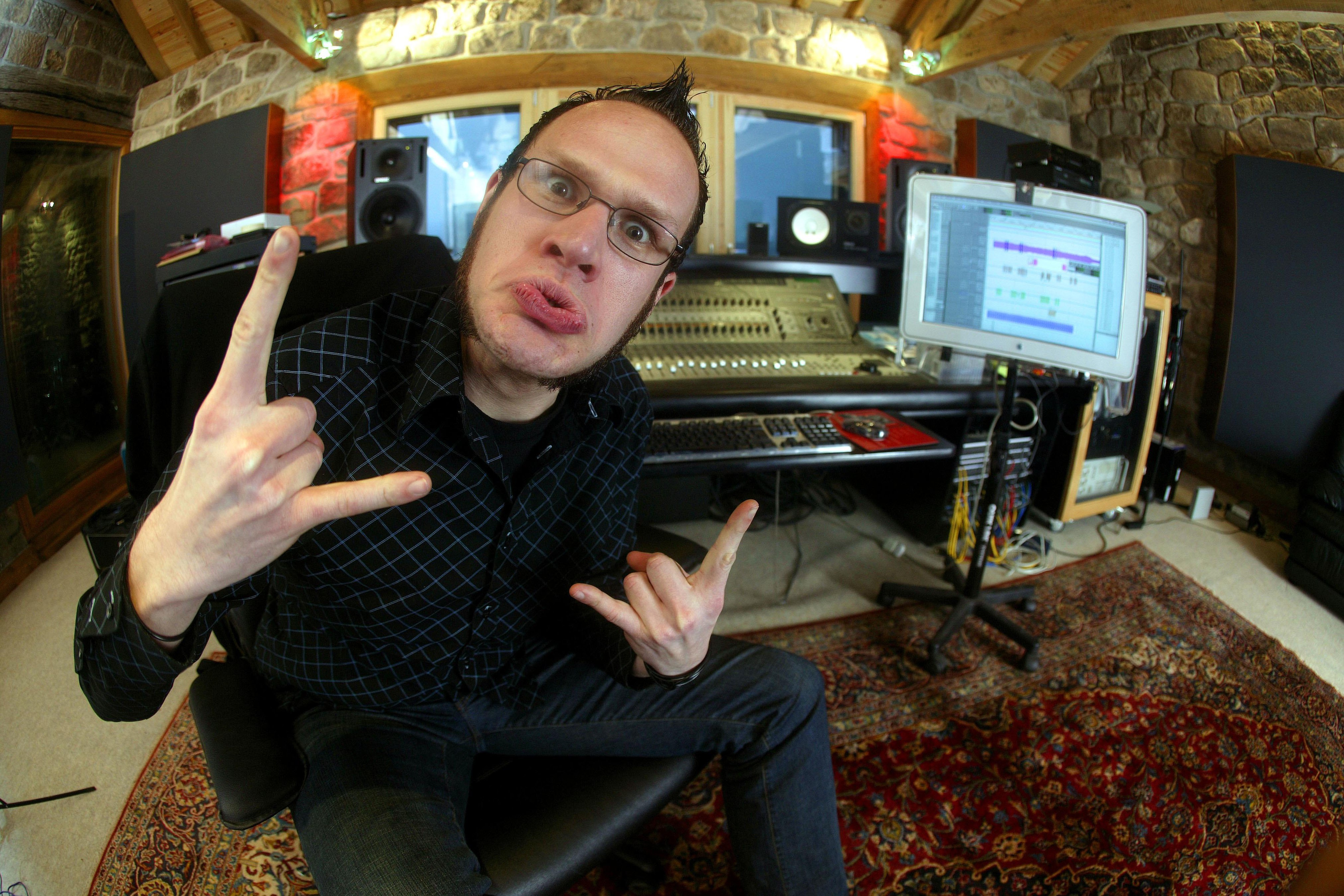 Adam D throwing the metal horns in the studio in 2004