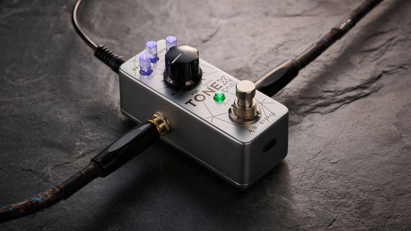 IK Multimedia Tonex One Bass: the mini-pedal offers amp modelling and heaps of tone options and is here photographed against a slate floor.