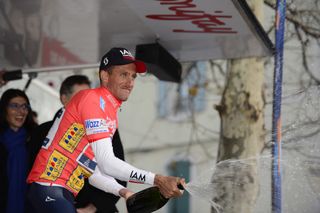 Jerome Coppel (IAM Cycling) sprays the winner's champagne having done the stage and overall double