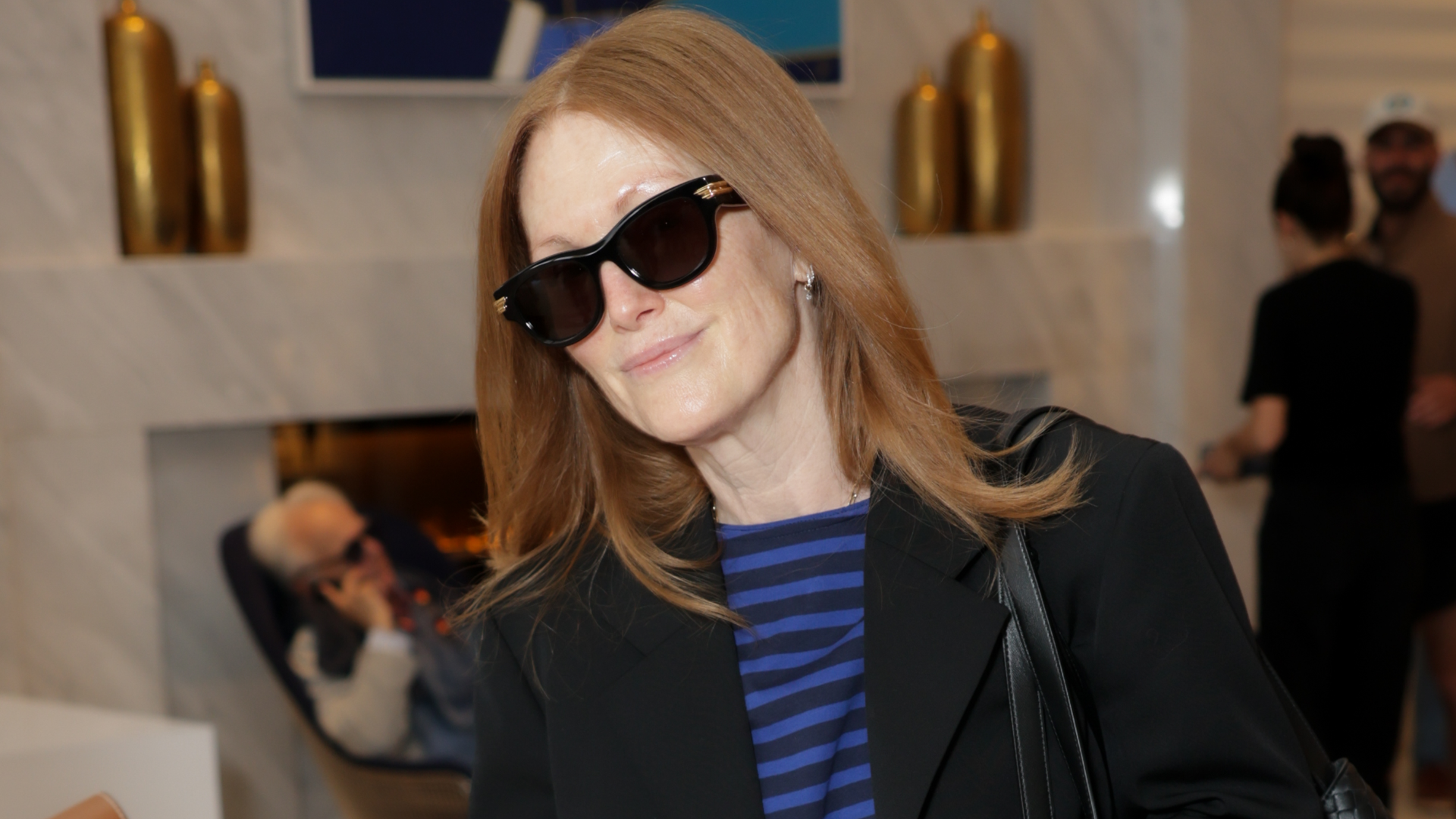 Julianne Moore wore the soft loafers trend while leaving the 2026 Cannes Film Festival