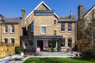 a victorian house with a large extension
