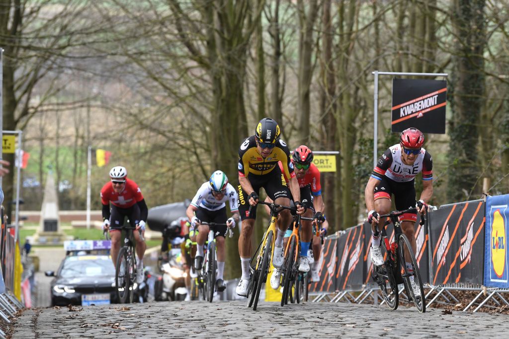WEVELGEM BELGIUM MARCH 28 Wout Van Aert of Belgium and Team Jumbo Visma Sonny Colbrelli of Italy and Team Bahrain Victorious Matteo Trentin of Italy and UAE Team Emirates Giacomo Nizzolo of Italy and Team Qhubeka Assos Silvan Dillier of Switzerland and Team AlpecinFenix during the 83rd GentWevelgem in Flanders Fields 2021 Mens Elite a 254km race from Ypres to Wevelgem Kemmelberg Ossuaire Cobblestones GWE21 GWEmen FlandersClassic on March 28 2021 in Wevelgem Belgium Photo by Tim de WaeleGetty Images