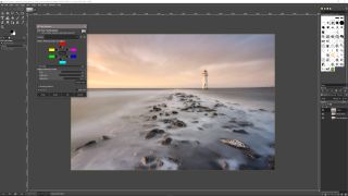 Screenshot of GIMP software editing a picture of lighthouse in the ocean