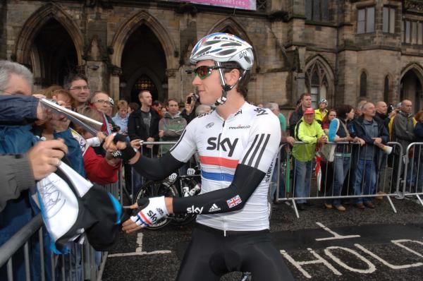 Geraint Thomas (Team Sky) signs autographs.
