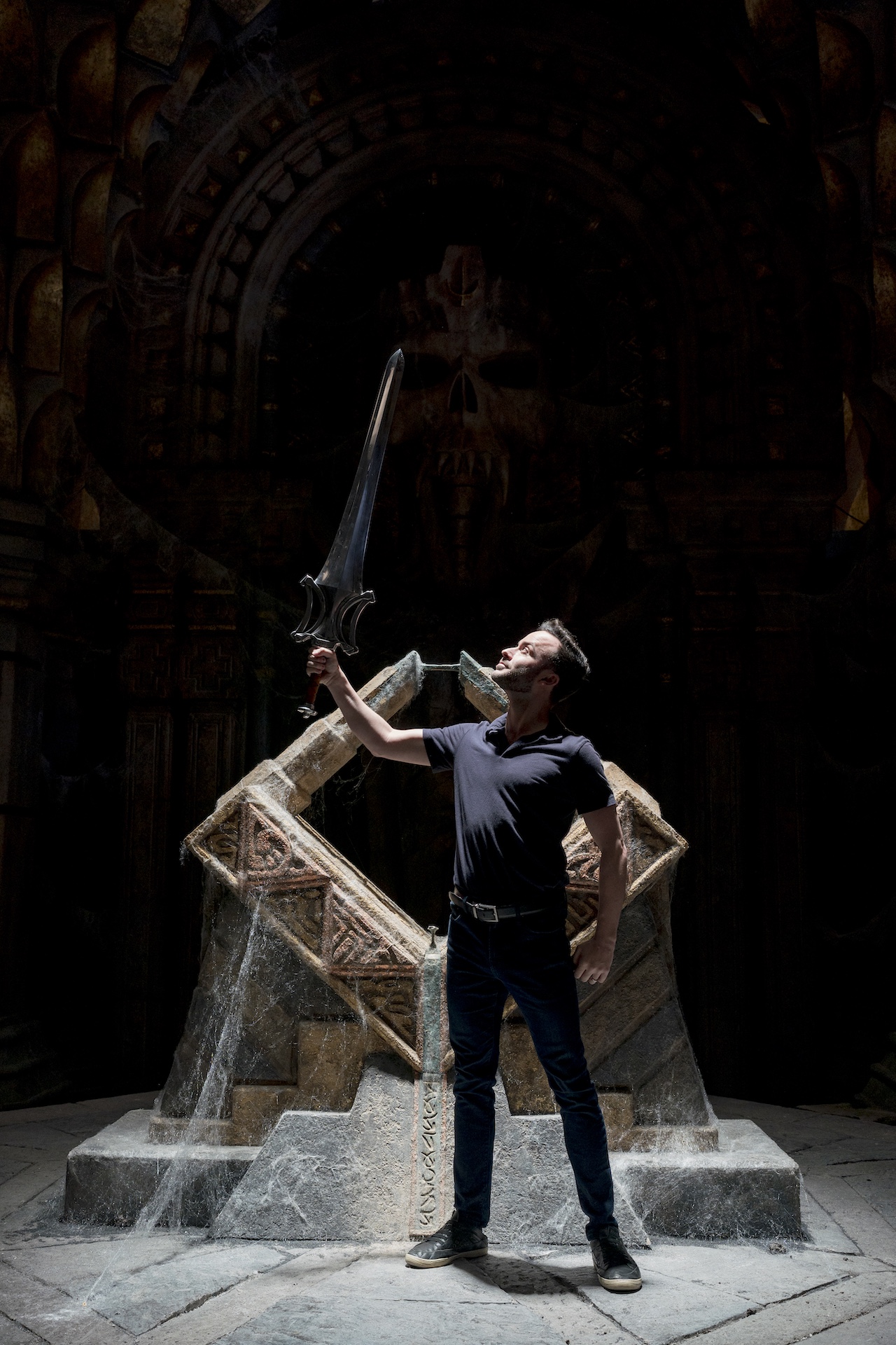 Corey Chichizola holding the power word in Castle Greyskull