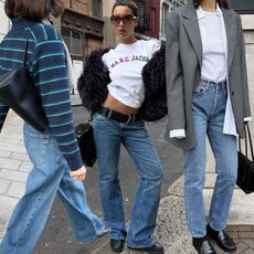 Women in various jeans styles