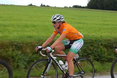 Race leader, Annemiek Van Vleuten (Nederland Bloeit) in the leader's orange jersey