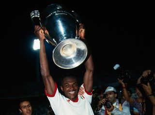 Marcel Desailly celebrates with the European Cup after AC Milan's win over Barcelona in the 1994 Champions League final.