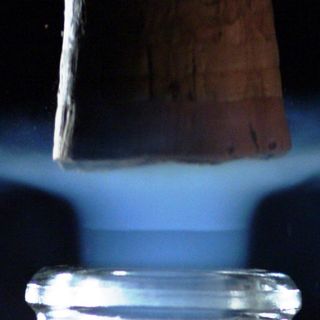 A visible shockwave called a "mach disk" forms when the cork leaves the champagne bottle.