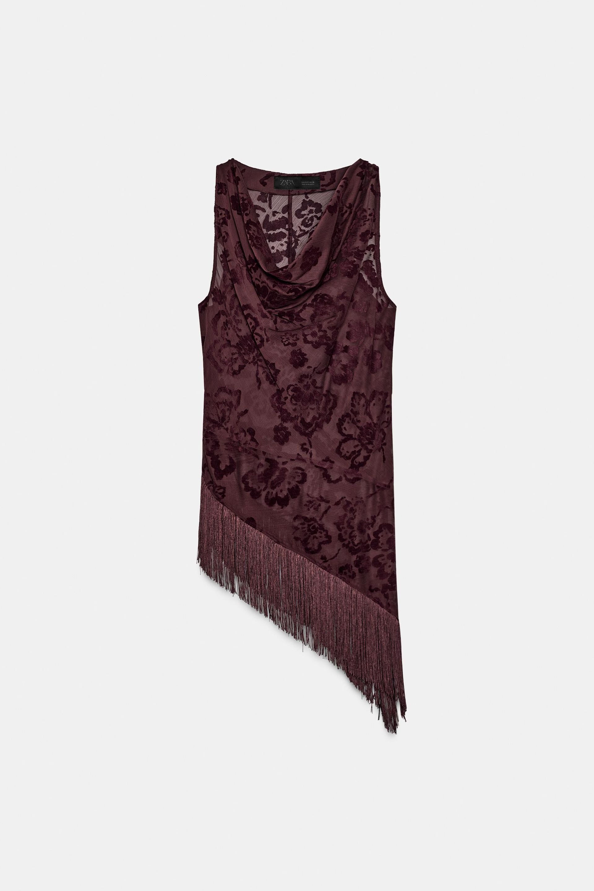 Asymmetric Fringed Burn-Out Top