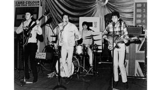 Rock band "The Who" perform at Shepherds Bush Bingo Hall for the film "The Kids Are Alright" in 1964 in London, England. (L-R) John Entwistle, Roger Daltrey, Keith Moon,
