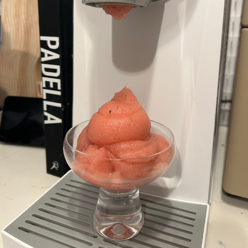 Cuisinart Frost Fusion Ice Cream Maker after making frose, sitting on drip tray