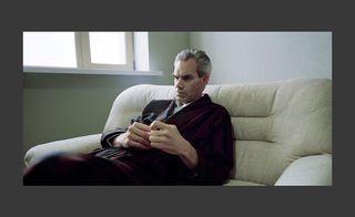 A man sitting on the couch