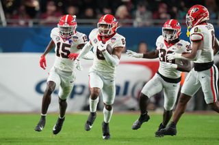 Georgia Bulldogs defensive back Daylen Everette (6) and *Georgia Bulldogs defensive back Daniel Harris (15) celebrates after an interception during the Capital One Orange Bowl game between the Georgia Bulldogs and the Florida State Seminoles on Saturday, December 30, 2023