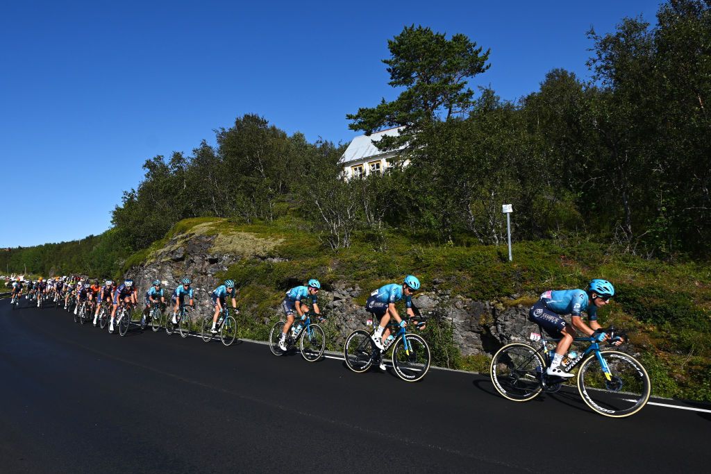 HARSTAD NORWAY AUGUST 08 Gleb Brussenskiy of Kazahkstan and Team Astana Premier Tech The Peloton during the 8th Arctic Race Of Norway 2021 Stage 4 a 1635km stage from Gratangen to Harstad 54m ArcticRace on August 08 2021 in Harstad Norway Photo by Stuart FranklinGetty Images