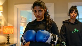 Priya Kansara with boxing gloves in Polite Society