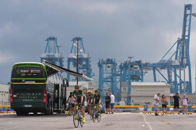 Team Europcar riders leave the bus and head out for the start of the stage