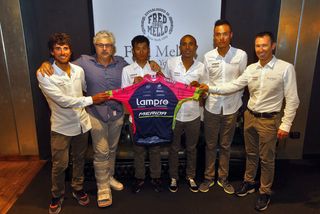 Roberto Ferrari, Mario Stupelli, Chun Feng, Tsgabu Grmay, Gang Xu and Brent Copeland with the new team jersey for the Giro d'Italia