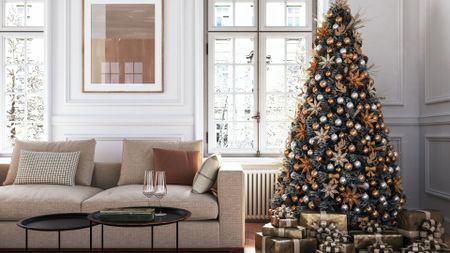 A stylish Christmas tree next to a biege sofa 