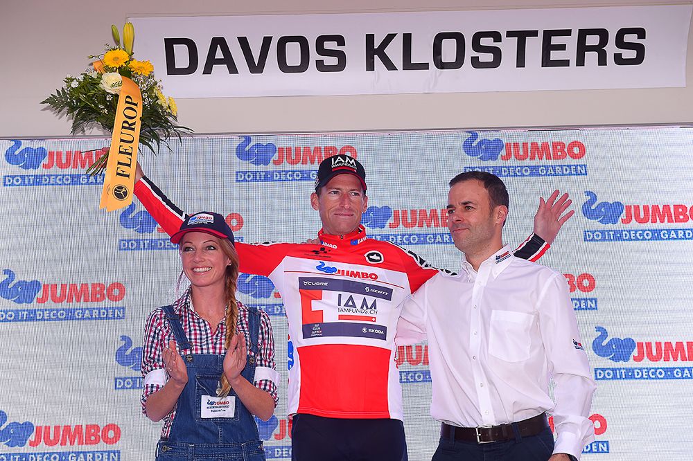 Martin Elmiger on the final podium at Tour de Suisse