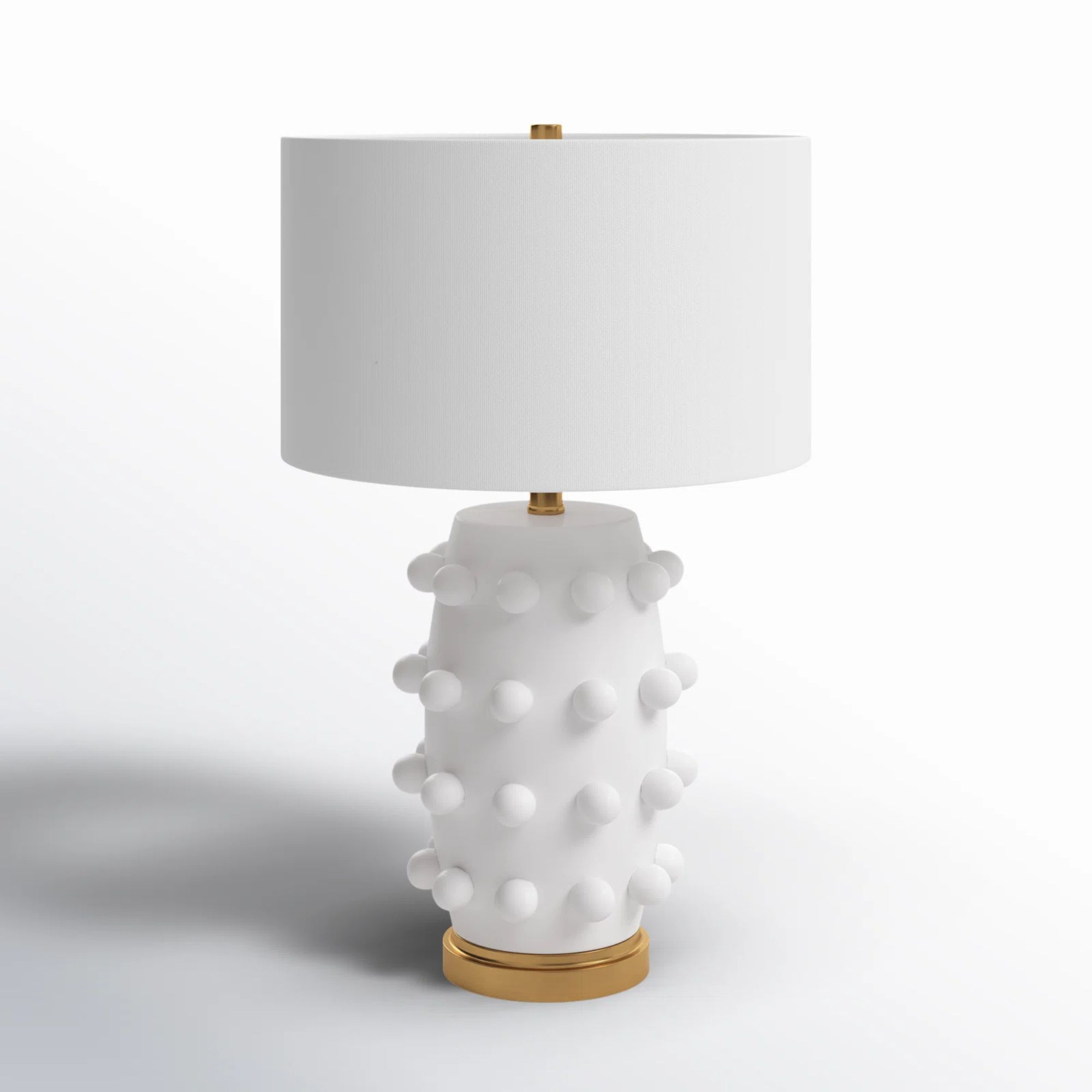 White ceramic lamp with bobbled design
