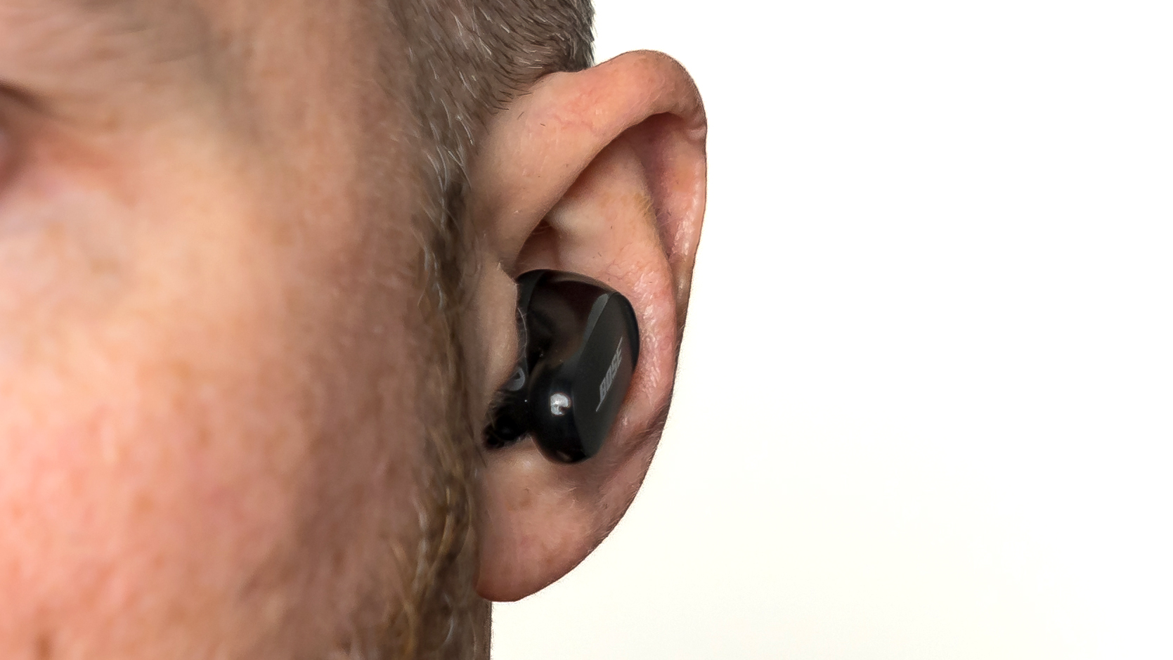 Close-up view of Bose QuietComfort Earbuds II in ear.