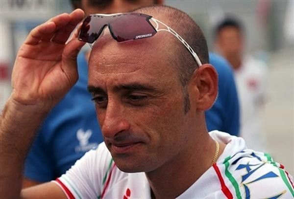 Defending Olympic Champion Paolo Bettini readies for a