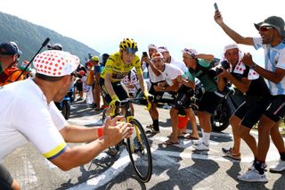 HAUTACAM FRANCE JULY 21 Jonas Vingegaard Rasmussen of Denmark and Team Jumbo Visma Yellow Leader Jersey competes to win while fans cheer during the 109th Tour de France 2022 Stage 18 a 1432km stage from Lourdes to Hautacam 1520m TDF2022 WorldTour on July 21 2022 in Hautacam France Photo by Michael SteeleGetty Images
