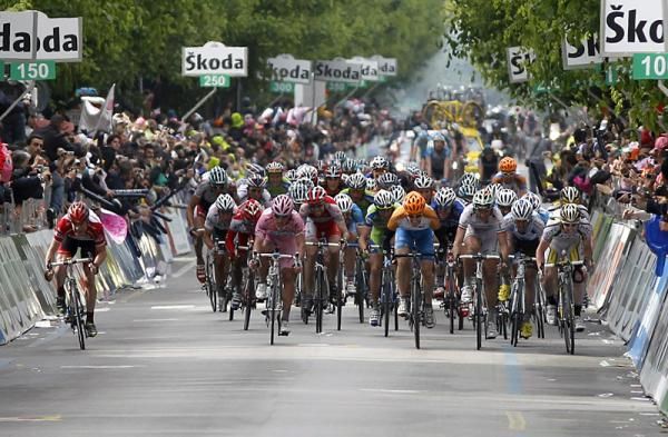 Cadel Evans (BMC), left, is passed by the sprinters inside the final 150 metres of stage nine.