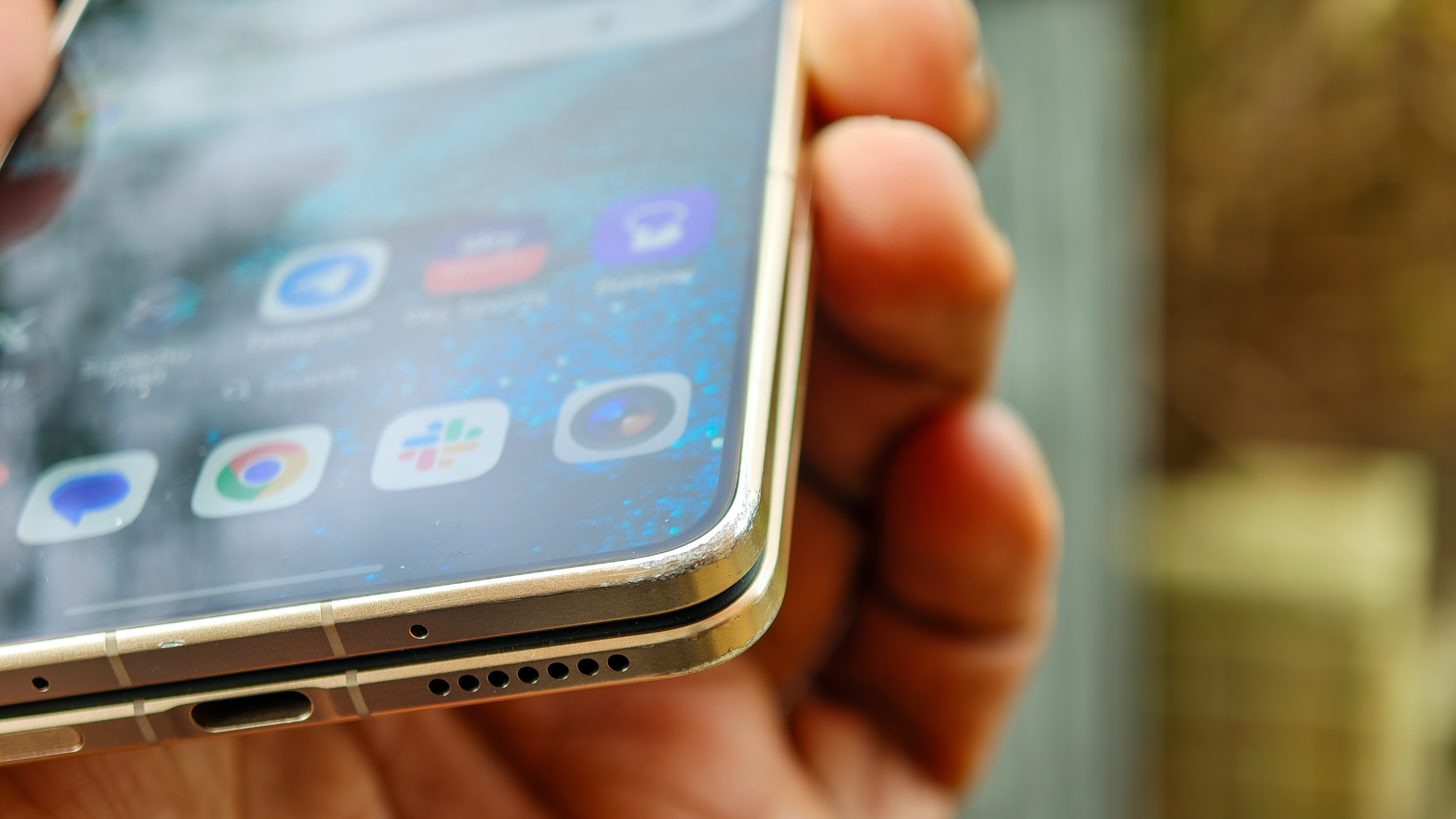 The Honor Magic V6 in gold after being put through a washing machine, complete with scratches and blemishes but fully working.