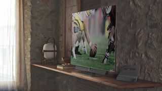 The Televes Bexia attached to a TV in a living room.