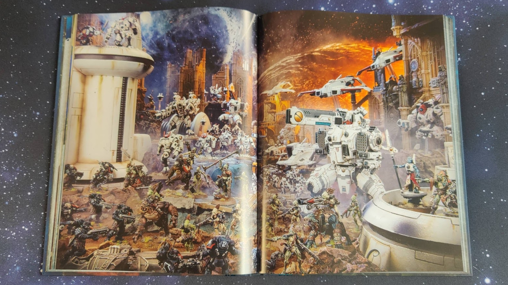 Open pages displaying T'au models