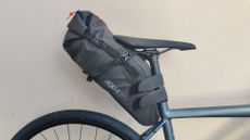 Image shows the Oxford Aqua Evo Adventure Seat Pack mounted on a bike