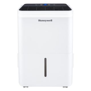 A white honeywell dehumidifier on a white backdrop