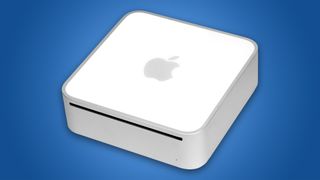 The Apple Mac mini against a blue background.