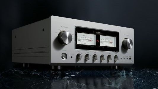 Luxman L-509Z amp on a marble counter and a black background