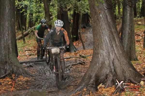 Lisa Krayer (Adventure 212/Specialized) maintains her balance through the slippery singletrack