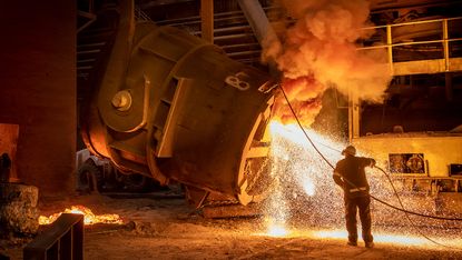 A steelworker in a British steel factory
