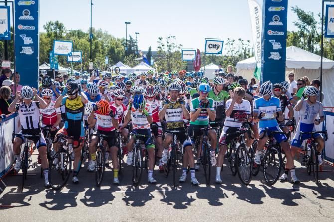 Riders click on the helmets just before the start