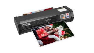 SINCHI laminator with a picture of people in santas hats coming out of it