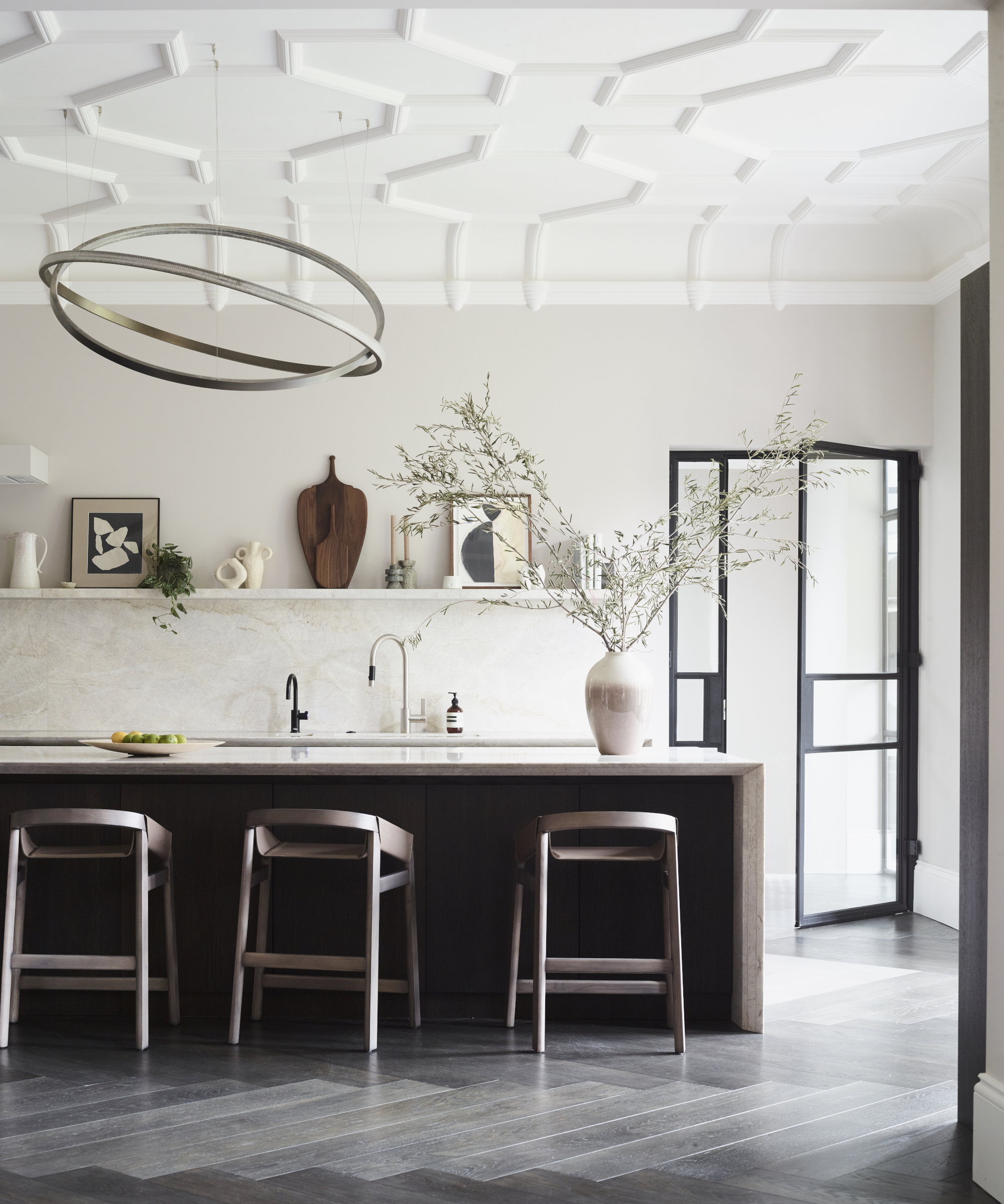 Modern house in a neutral, monochrome palette with pastel pink touches