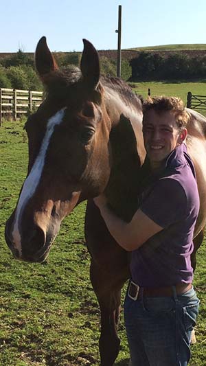 Bozzie (Cornacrew) back at home in his field after Burghley with Simon