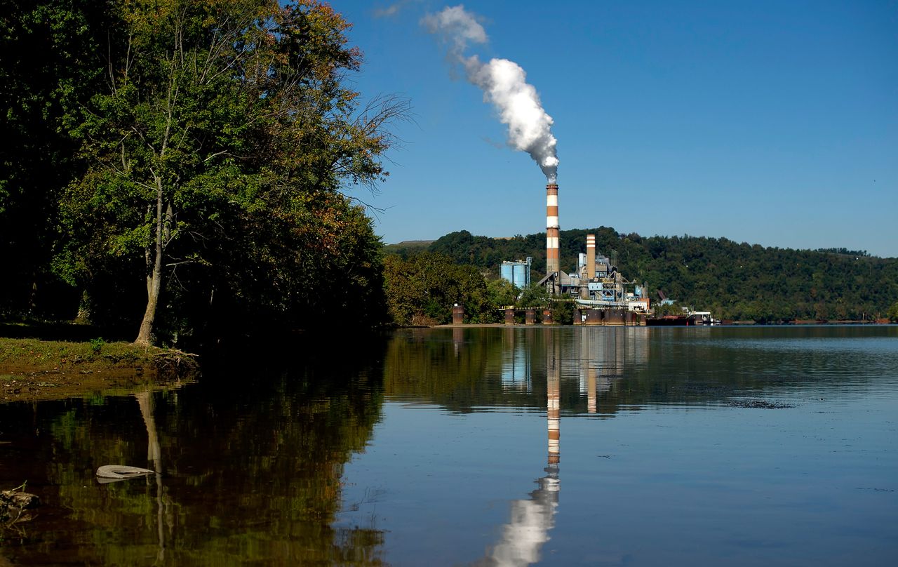 Coal-fired power plant near water.