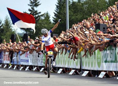 Czech World Cup winner Jaroslav Kulhavy (Specialized) greets the fans as he finishes