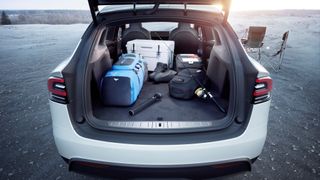 tesla model x plaid trunk space with seats folded down
